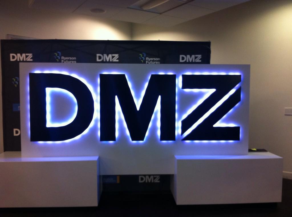 Apparently if I tweet #dmz this sign will change colours. Will report back with findings #interactiondesign