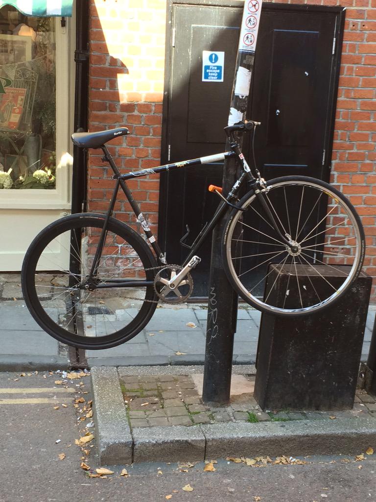 Lack of spaces to lock my bike = lots of space beneath my wheels. Take that Oxford!