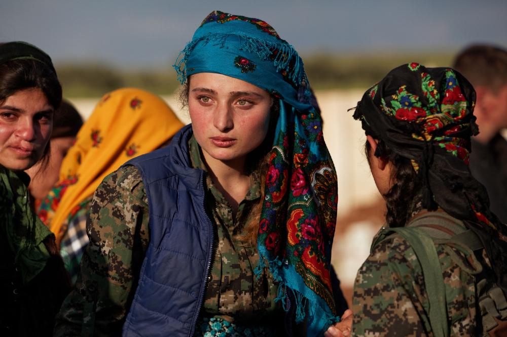 VICENews's tweet photo. In Photos: Grief, pride, and hope in the ruins of Kobane http://t.co/9xT3v7csIf http://t.co/wsYfs4Bumn