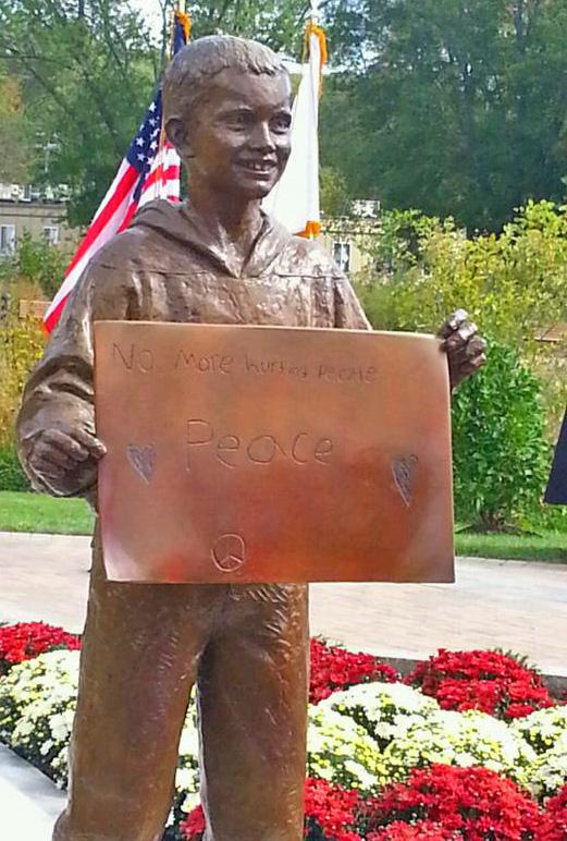 bostonpolice's tweet photo. ICYMI: Kudos to @NewsForBSU for unveiling of statue and academic program in honor of Martin Richard. #Peace http://t.co/7wLdWZnBGJ