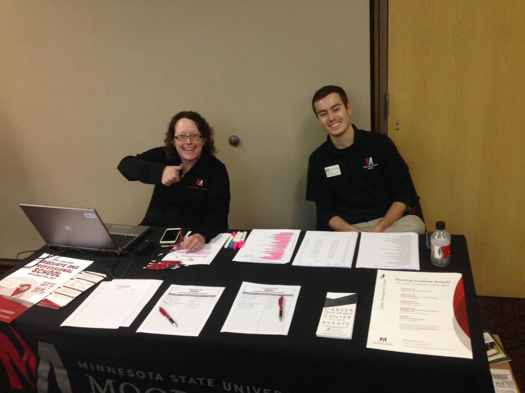 ADDougPeters's tweet photo. Yes @Robb_MSUM &amp; @BobbieD77 are #firedup welcoming people to the Tri-College post graduate fair! http://t.co/hqumJetjwG