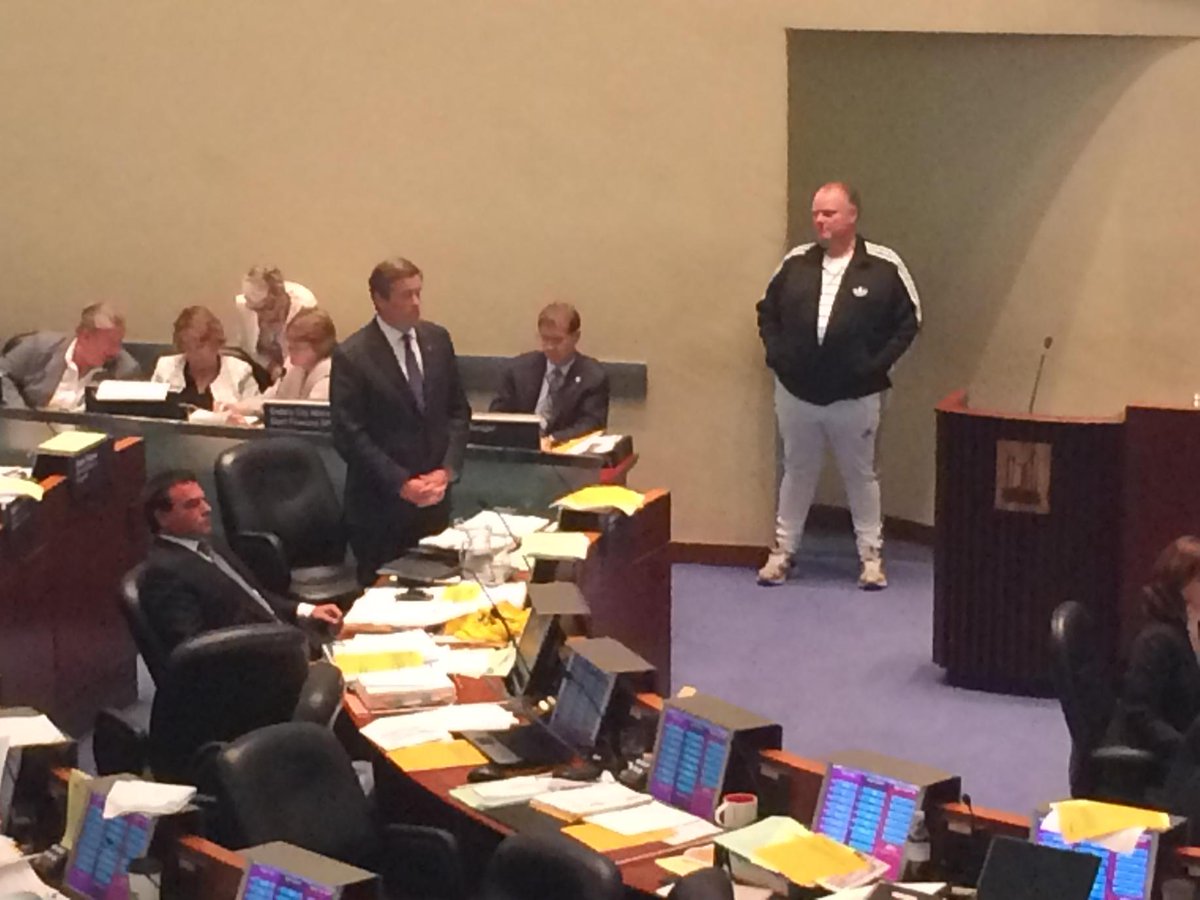 donpeat's tweet photo. Rob Ford keeps coming back to this spot in the council chamber to stand and watch John Tory #TOpoli http://t.co/oFQMf6mGuD