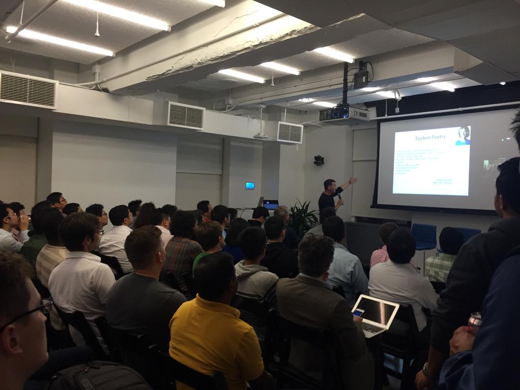 shirshanka's tweet photo. @joe_hellerstein gently explaining coordination to a packed crowd. #libigdata http://t.co/ujMSWqauJN