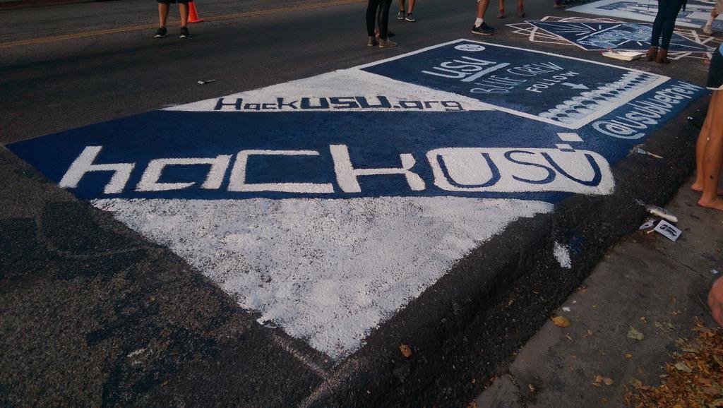 hackusu's tweet photo. Painted the road for some reason. #WeAreHackUSU http://t.co/pRmyO08bM1 http://t.co/mSU8x1aBF4
