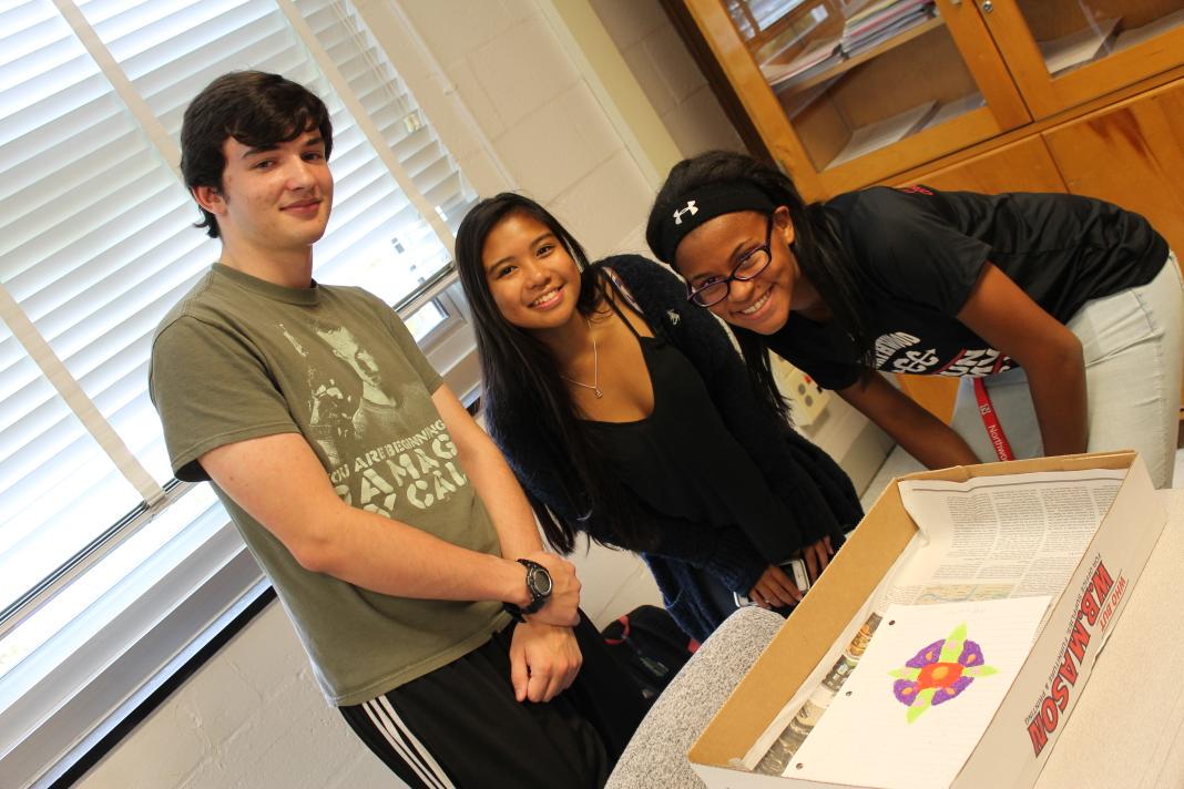 FormerNhs's tweet photo. Students in Bond-Lamberty's Comparative Religions class create mandalas with colored sand. #GreatLearningExperiences http://t.co/oxxqYxH6g1