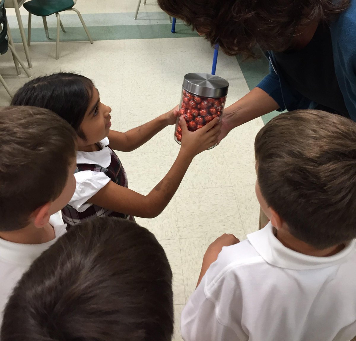 bayviewglen's tweet photo. Zayna was the Grade 1 winner of the "guess how many" in the jar at the Let's Get Social Fall Fest booth. #greatmath http://t.co/FIzwQXZgIF
