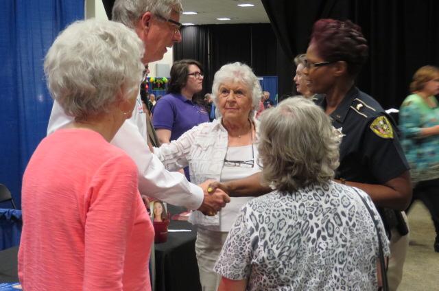 Larry at the Southern Hills business expo and taste of southern hills. Talking with people of Southern Hills. #caddo