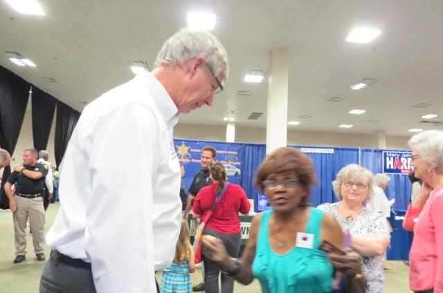 Larry at the Southern Hills business expo and taste of southern hills. Talking with people of Southern Hills. #caddo