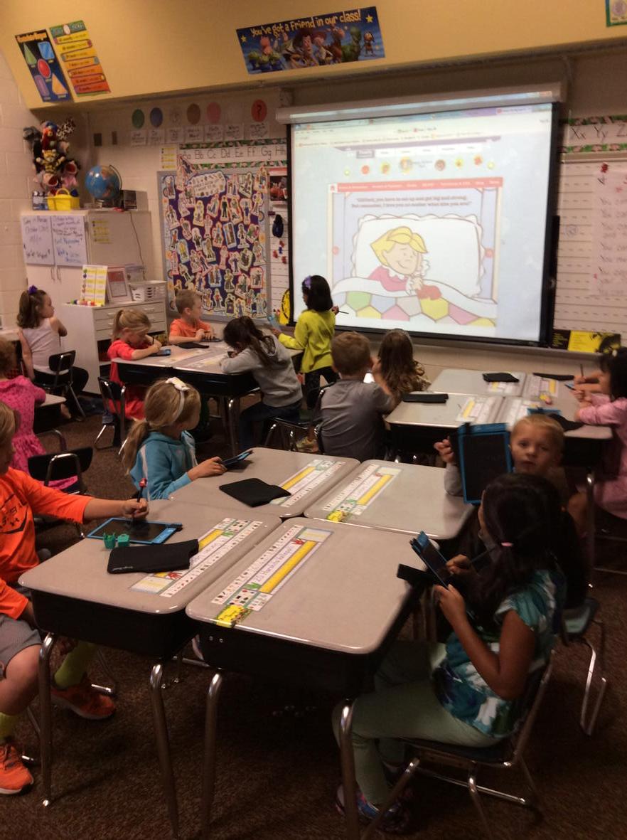 Finding adjectives is really fun when we use our cool Boogie Boards!