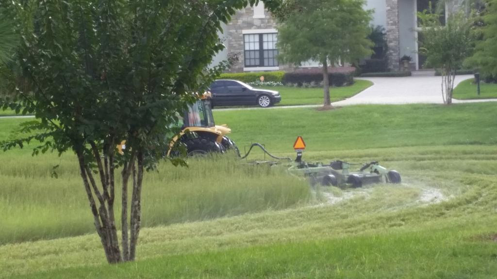 Mowing when it maybe just a little too wet. #boysandtoys