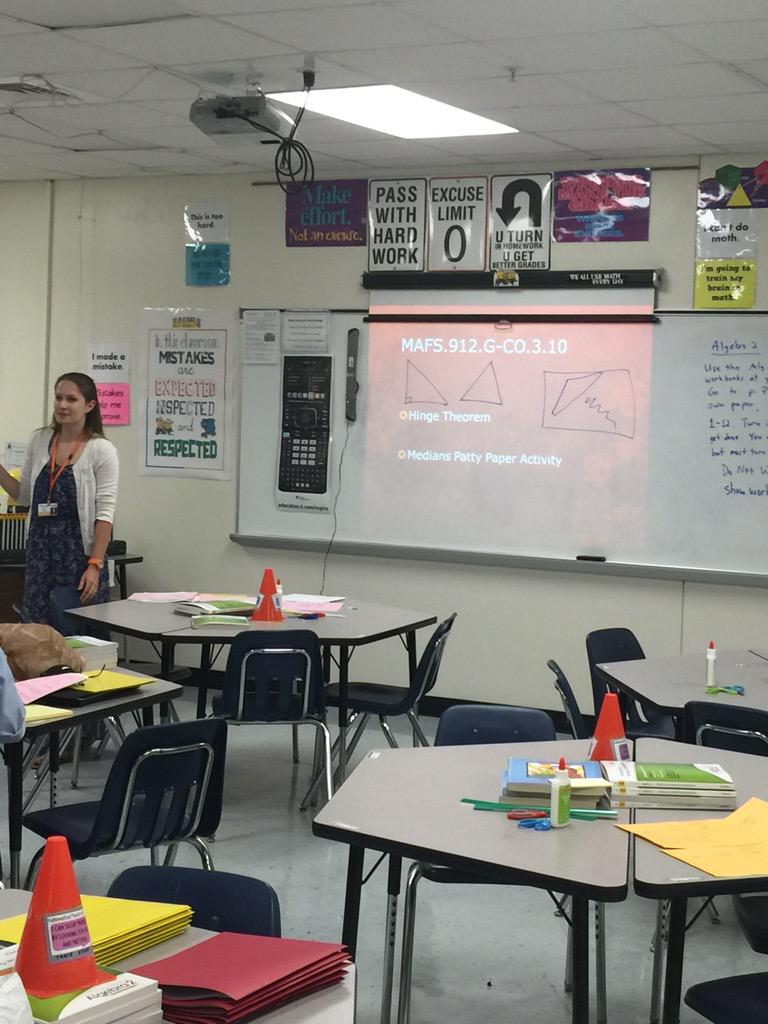 VCSMath's tweet image. Geometry teachers discussing the hinge theorem #mommasmath #e3y1