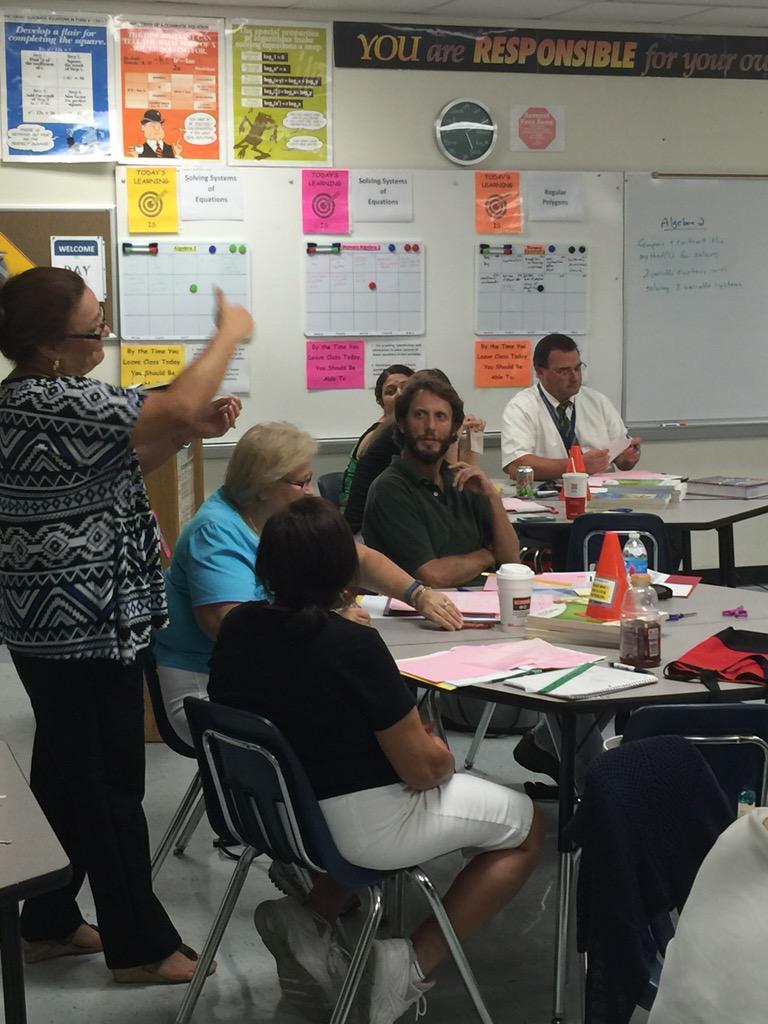 VCSMath's tweet image. Geometry teachers discussing the hinge theorem #mommasmath #e3y1