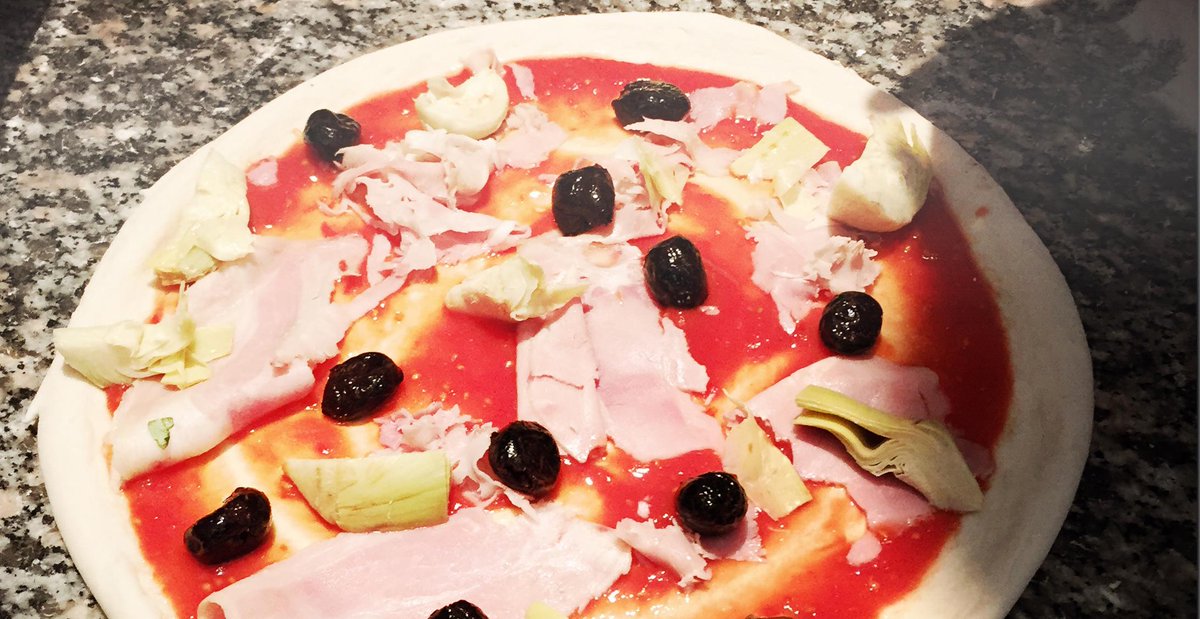 Princi_London's tweet photo. Adding toppings to a Cappricciosa – ham, artichoke, black olive, mozzarella and tomato. #pizza #spiritodimilano http://t.co/IdIFXymh19