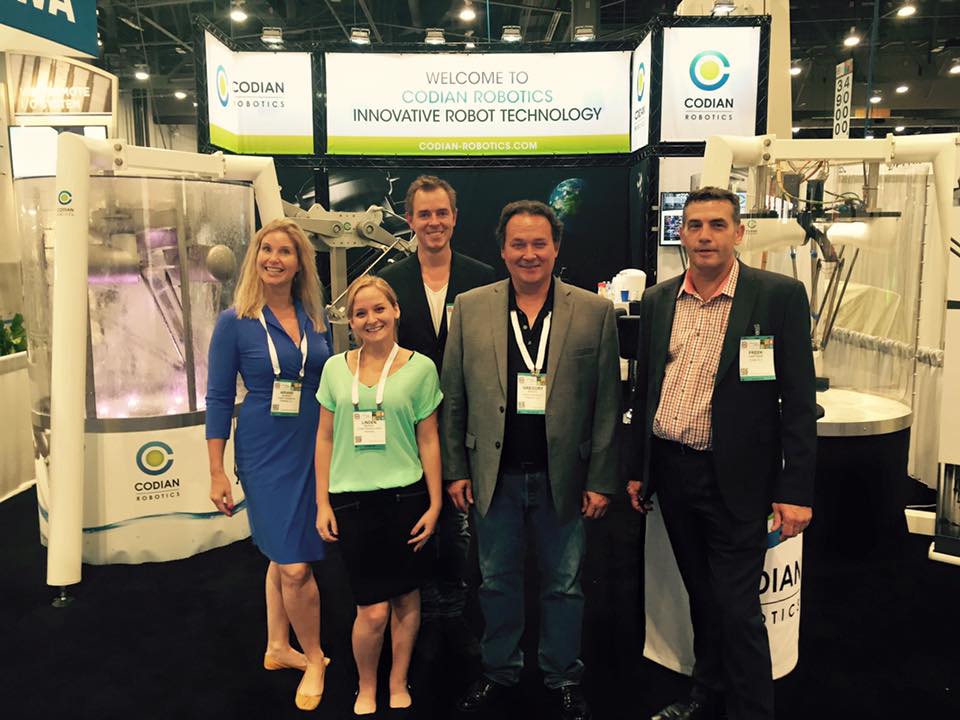 Codian Robotics has hundreds of booth visitors at Pack Expo 2015 to see our running D5 and D4-HD robots.