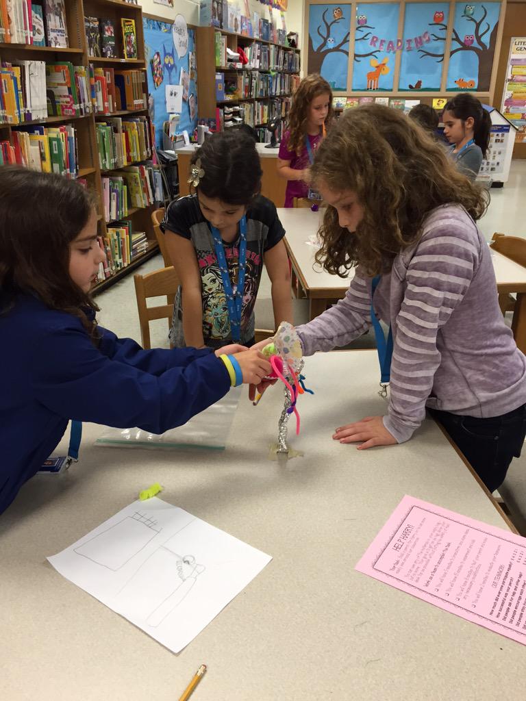 SPES_Library's tweet photo. 3rd graders using problem solving and critical thinking to build a perch for Harry @spes0310 #helpharry #STEM http://t.co/a8U3S8DwAe