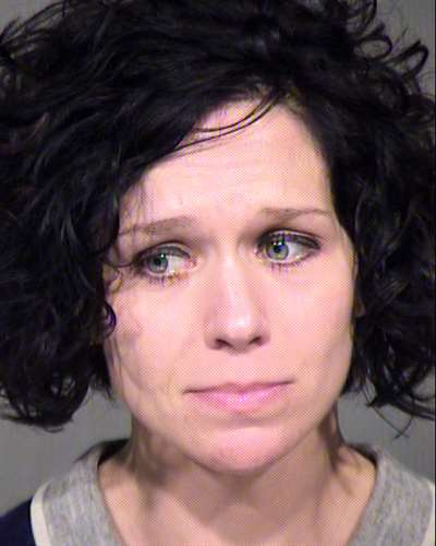 FOX10Phoenix's tweet photo. Brian and Jennifer Woolsey, two Peoria high school teachers arrested today. http://t.co/2WnL1uJPdM