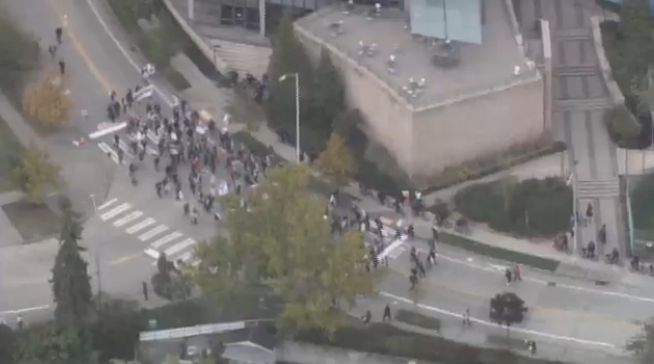 KIRO7Seattle's tweet photo. Protesters marching against construction of #UW animal research lab
Watch live >> http://t.co/xVCm30OqFJ http://t.co/AHLCztha7V