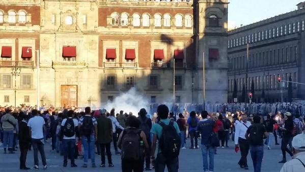 saulocorona's tweet photo. #Mexico City: Riot police fire tear gas at #2deOctubre protesters in #Zocalo Sq. #2DeOctubreNoSeOlvida #2OctMX http://t.co/eWef8ANHuS