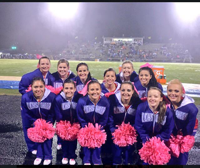 LCHS_Cheer1's tweet photo. You may not be able to tell, but we're definitely soaking wet. Cheering rain or shine! Falcons up 7-0 at the half ☔️💦 http://t.co/Bzr4LddbHB