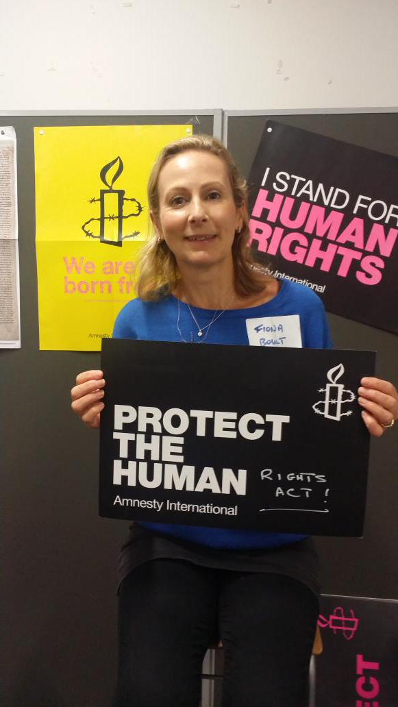 amnestykingston's tweet photo. @amnestylondon # AmnestyLondon conference members arriving and taking the HRA photo pledge. http://t.co/3eR4D1rUBe