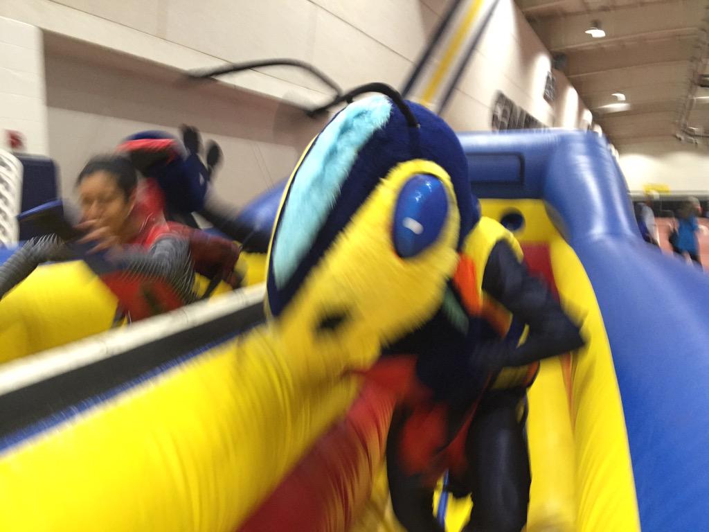cedarville's tweet photo. It's getting heated in the Field House as our Jacket starts competing on the inflatables! #CvilleHC #notjustforgrads http://t.co/YtCMxEwIwQ
