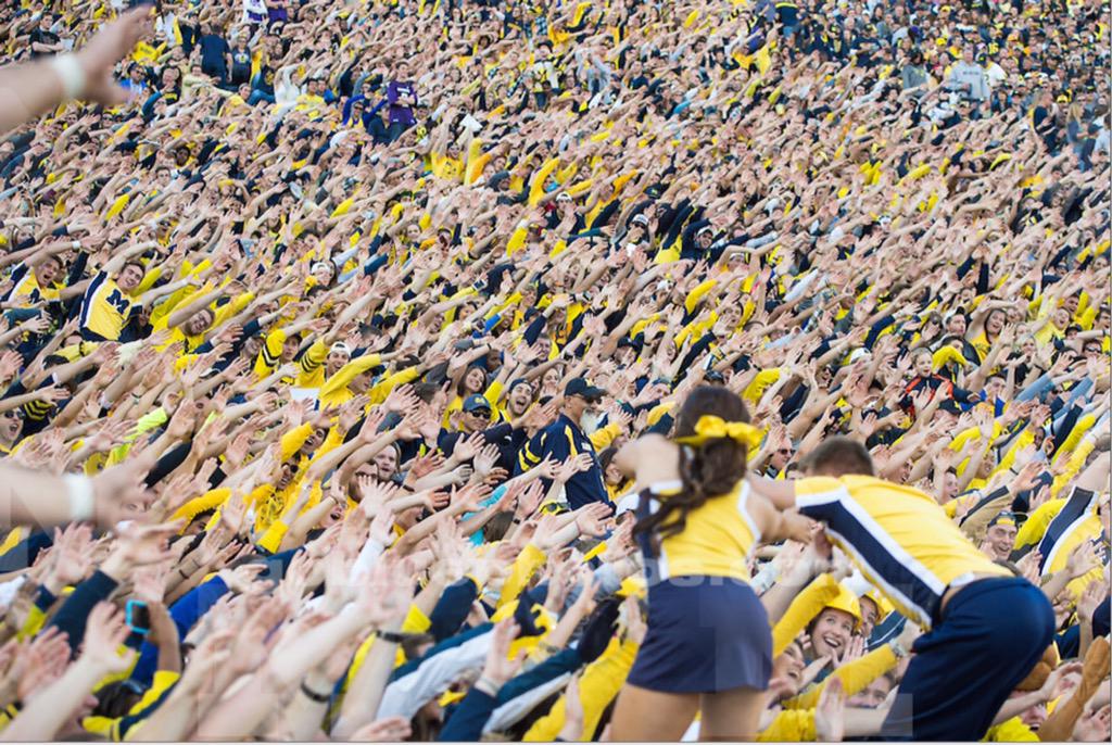UMich's tweet photo. What a wild ride today #Wolverines! 🎢 Thanks for joining us on the 'World's Largest Human Rollercoaster.' #GoBlue http://t.co/smbm5ruP8H