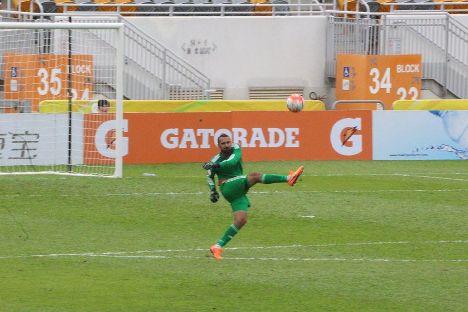 Naumovski kicks the ball Naumovski kicks the ball