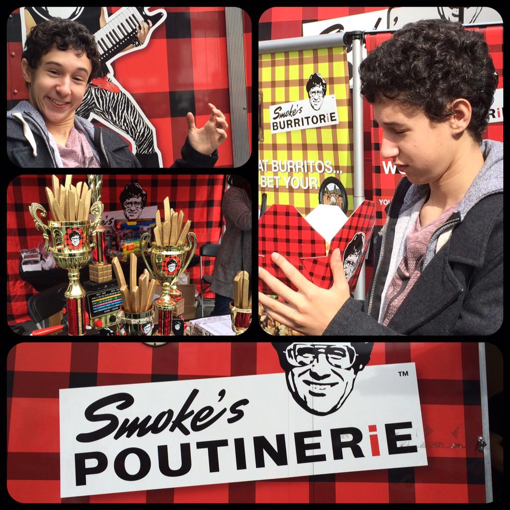 SimonCadel's tweet image. Stopped by @poutinerie world poutine eating competition. They take this national delicacy seriously. #smokespoutine