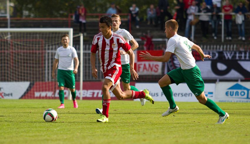 Kostadinov dribbles the ball Kostadinov dribbles the ball