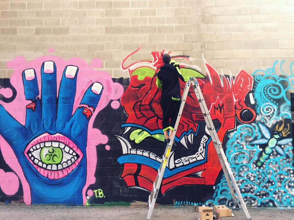 Misfit_Con's tweet photo. Our favorite misfit street artists are at it in #fargo again. Check out the wall behind the Forum #freewafargo http://t.co/7n54PgWcch