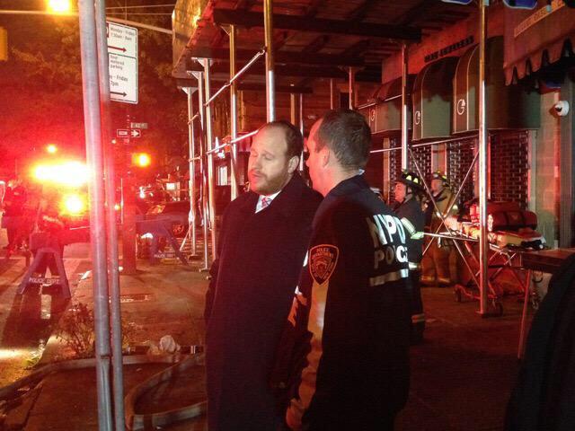 SafetyFirstNYC's tweet photo. More; Councilman @NYCGreenfield being briefed by News reporters regarding #BrooklynExplosion this morning. http://t.co/VJTuF2AX3Y