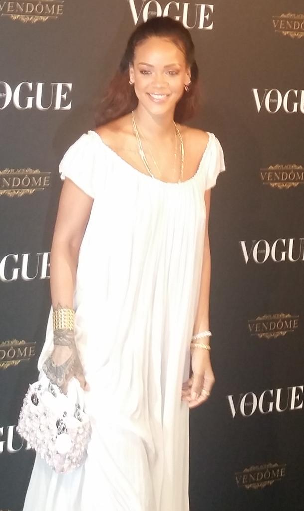 FashionsWeek's tweet photo. Rihanna &amp; Kanye attend Vogue 95th anniversary Party #PFW Paris http://t.co/g48oFHS02h