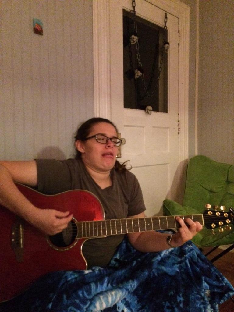 .5 of daga sitting on a couch, ft. World's smallest painting