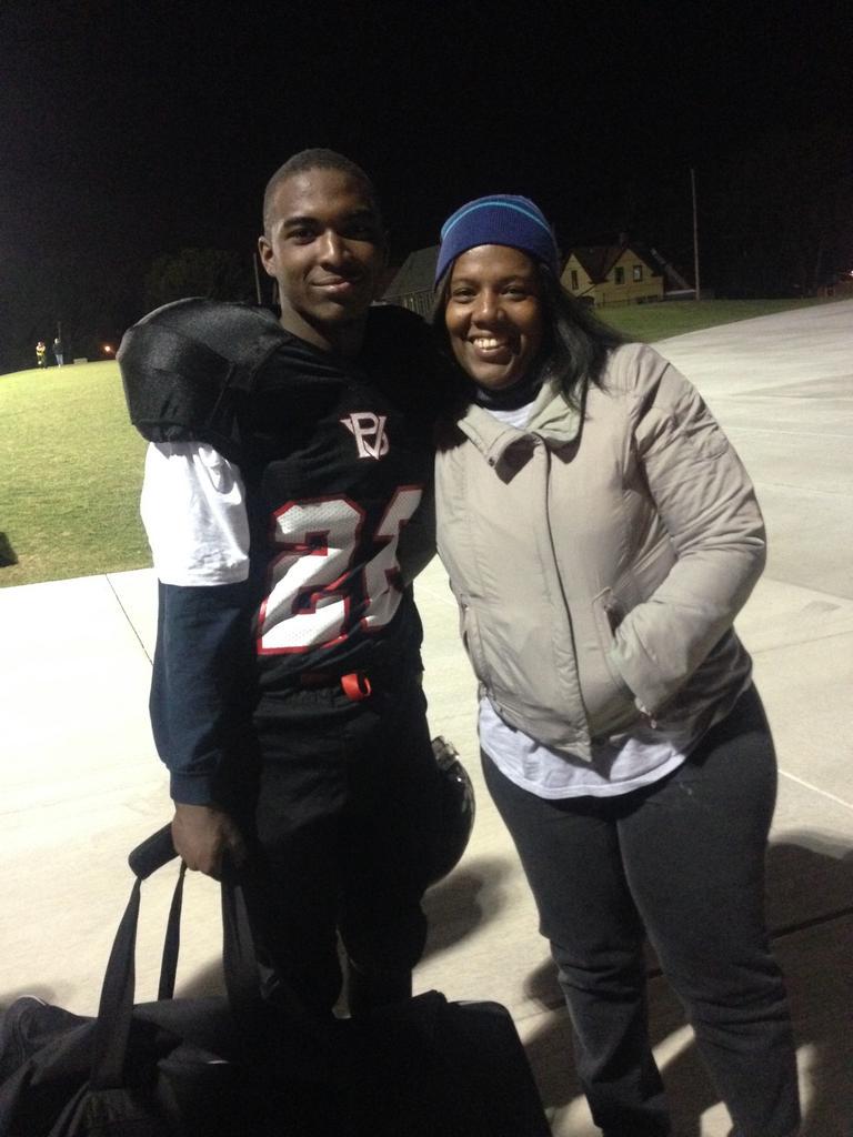 virtualworldcom's tweet photo. Me and my son after the homecoming game. Proud of the @BVHS_Milwaukee  football team. #believeinbayview http://t.co/QlrdbaoCYh