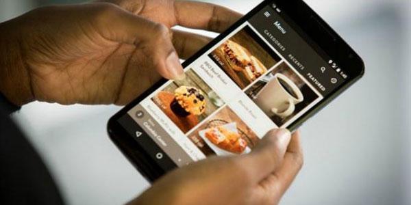 Starbucks rolls out pre-ordering smartphone service to the UK bit.ly/1L1fUyc by <a href="/TheSamEdwards/">Sam F. Edwards</a>