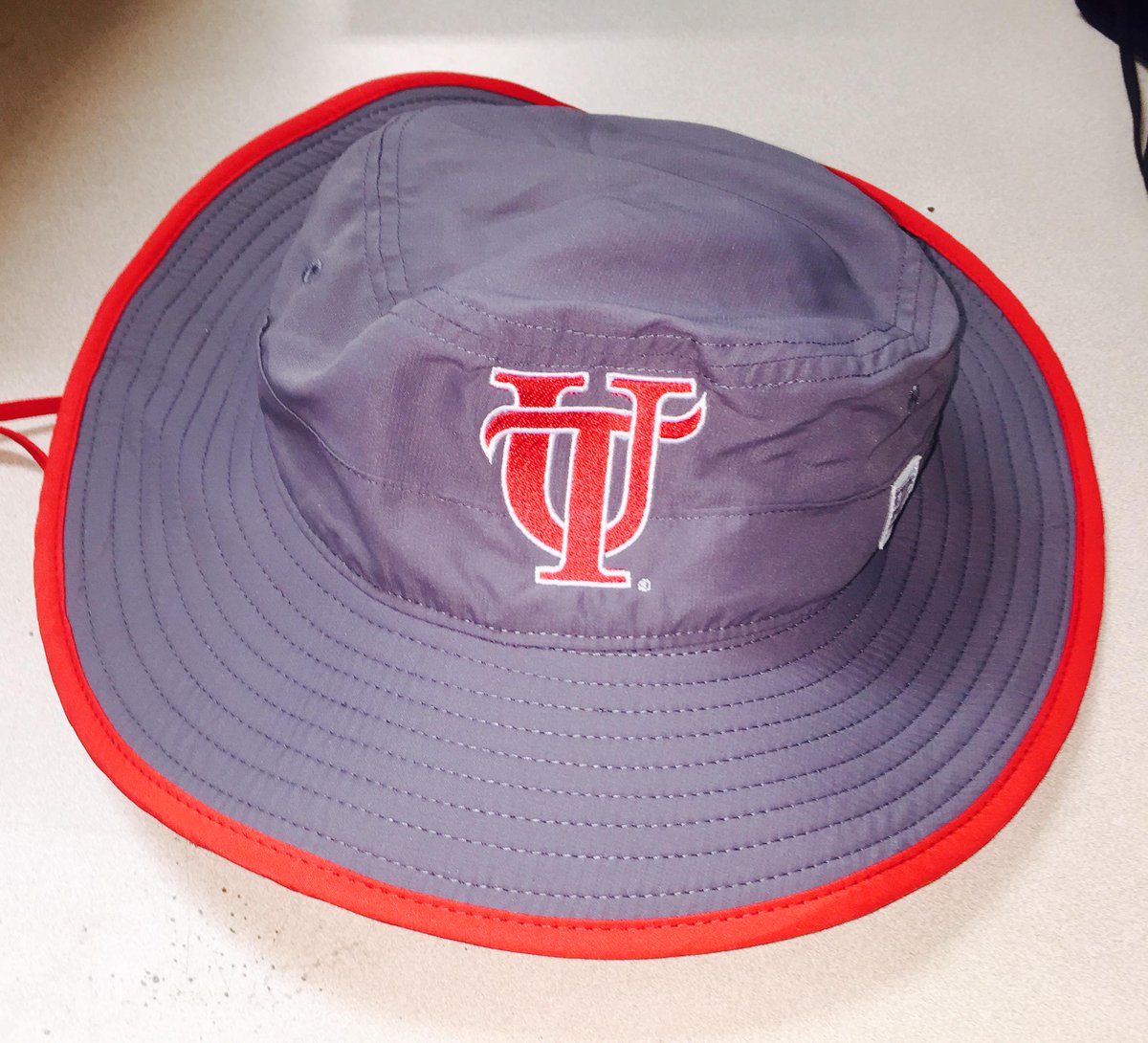 Newest arrival - wide-rimmed bucket hat and very light weight.  We will personalize with your logo.