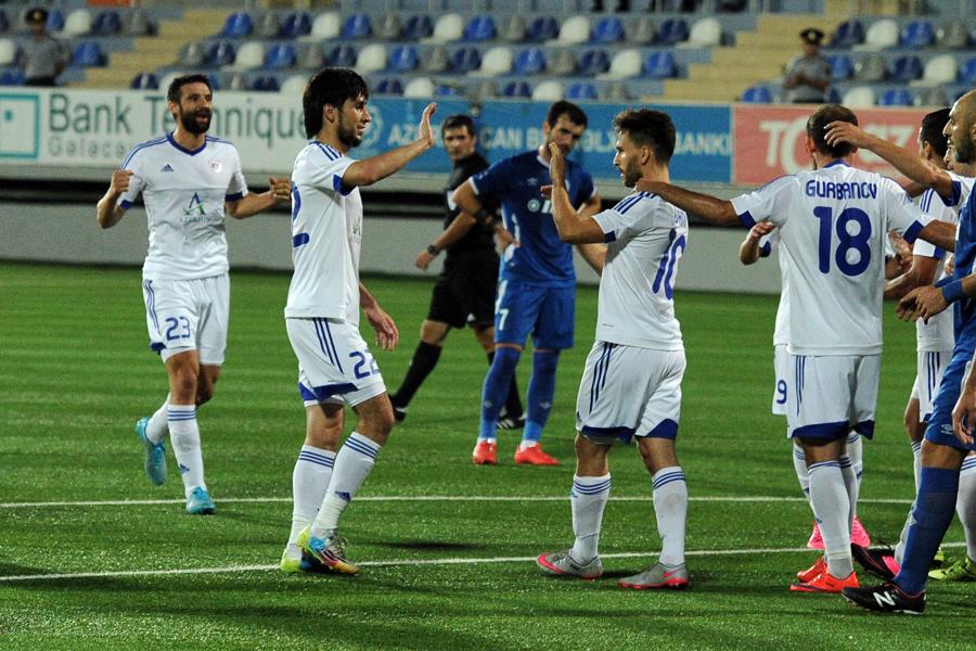 Dimitrovski and teammates celebrate after a goal Dimitrovski and teammates celebrate after a goal