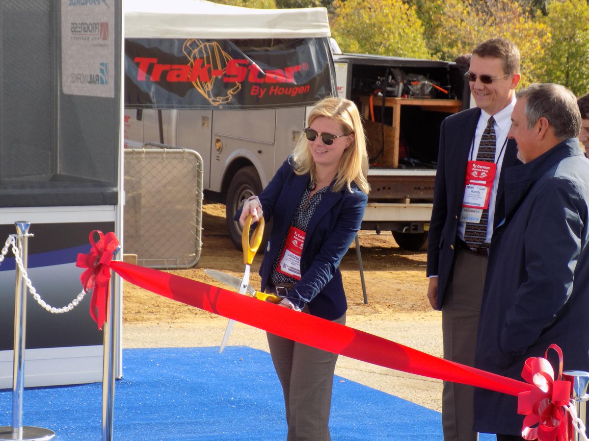 REMSAOfficial's tweet photo. REMSA's Urszula Soucie cutting the ribbon at the @BNSFRailway rail yard for the @RailwyInterchg @StarTribune @RTSMag http://t.co/G6RtwGGim6