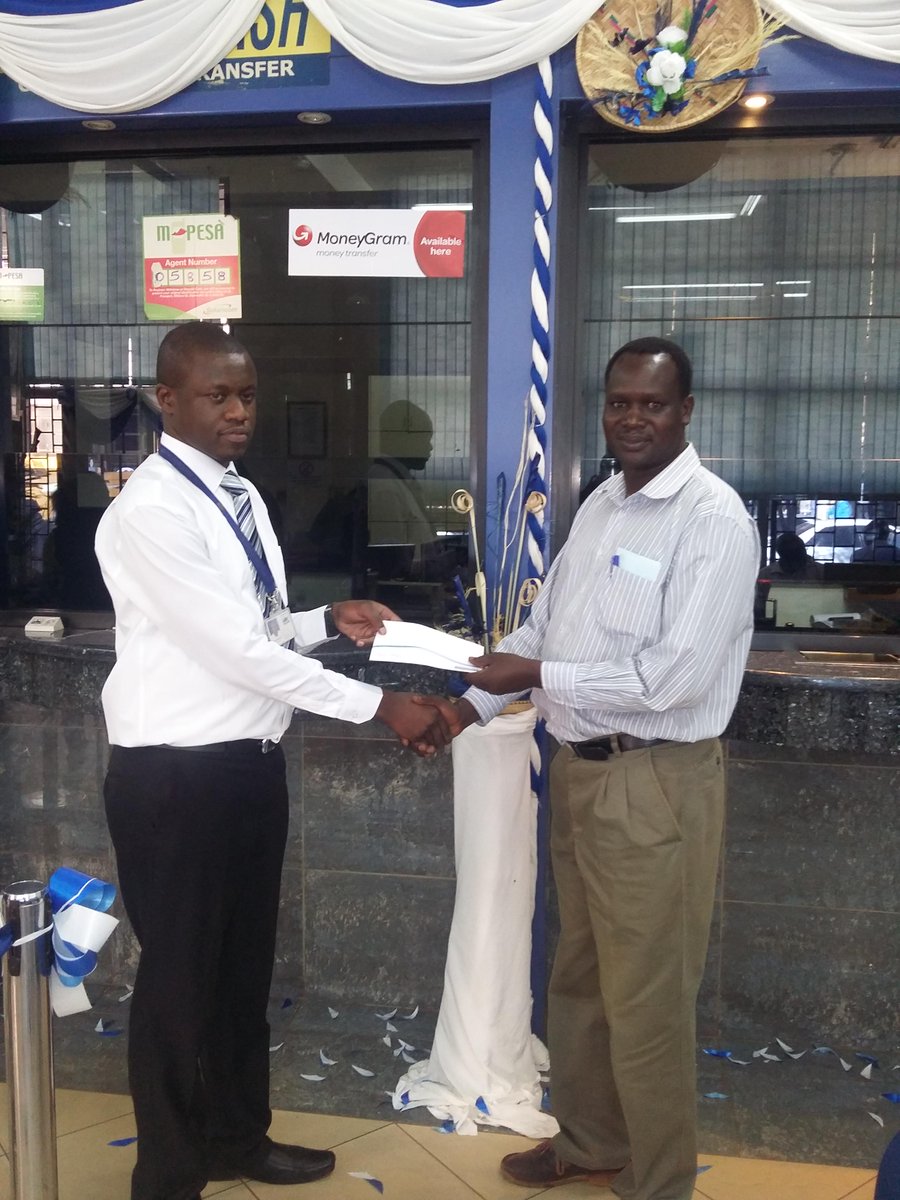 tindi_philip's tweet photo. @ABCBankGroup Mr. Biwott receiving a shopping voucher from Victor Oundo. We welcome you always to our Eldoret Branch http://t.co/kg543gvKgd