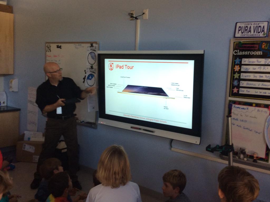 Students listen eagerly as @RuskTeach explains correct iPad usage. <a href="/DscAPSG4/">Discovery APS 4th</a>