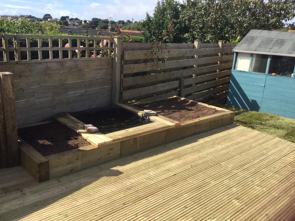 RobsLandscape's tweet image. #Pond and sleeper beds on a decking with new turf. A new arch for a #rose #garden #PlymouthHour #landscaping