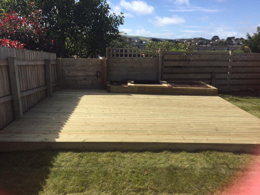 RobsLandscape's tweet image. #Pond and sleeper beds on a decking with new turf. A new arch for a #rose #garden #PlymouthHour #landscaping