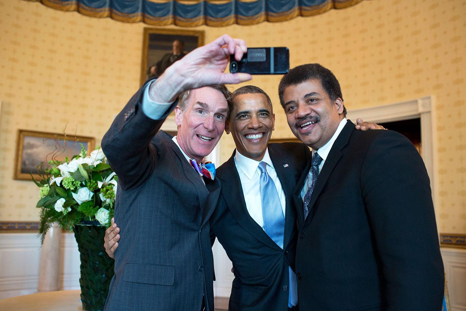 Happy birthday, Neil deGrasse Tyson, shown in this public domain photo with Bill Nye and U.S. President Obama. 