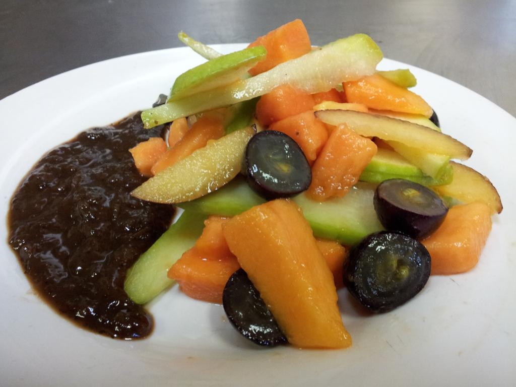 AlkalineElectric fruit salad featuring organic Chayote squash with a keylime Tamarind Bladderwrack reduction sauce #