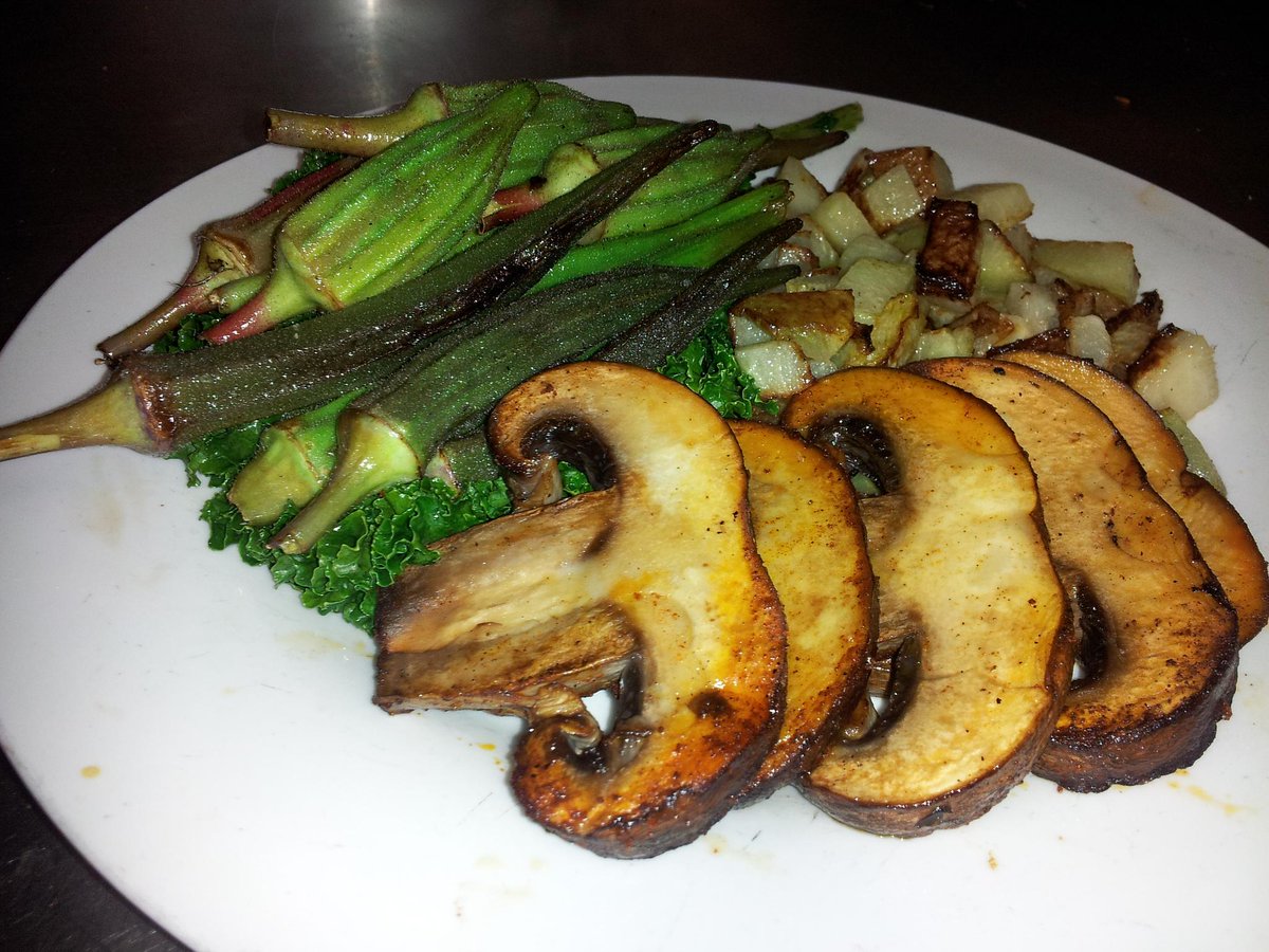 Achiote chile seared Portobella with Chayote squash Taters and tender baby crimson Oakra on charred kale CHEFWILLhsv