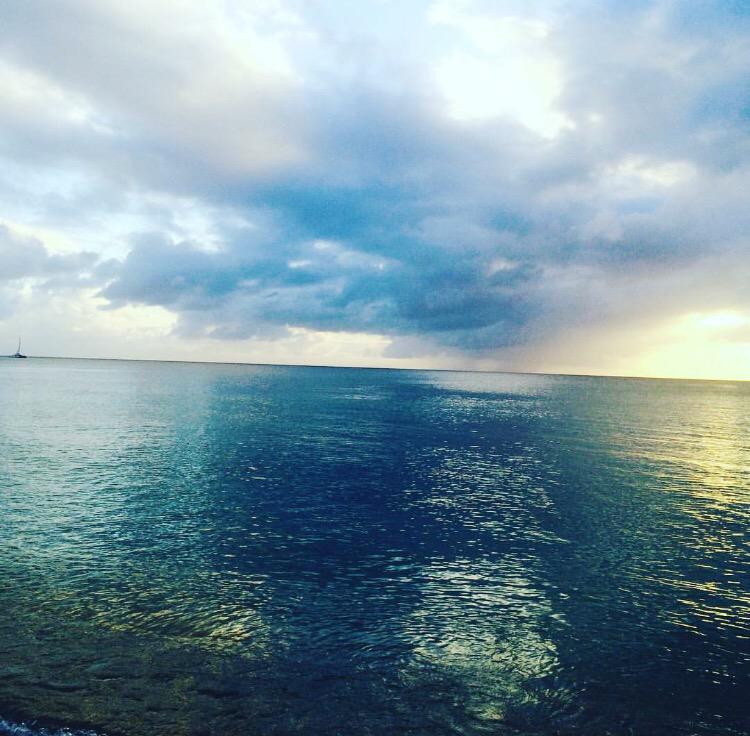 It's #TravelTuesday sunset view from #Hawksbill #beach in #AntiguaAndBarbuda! #ttot