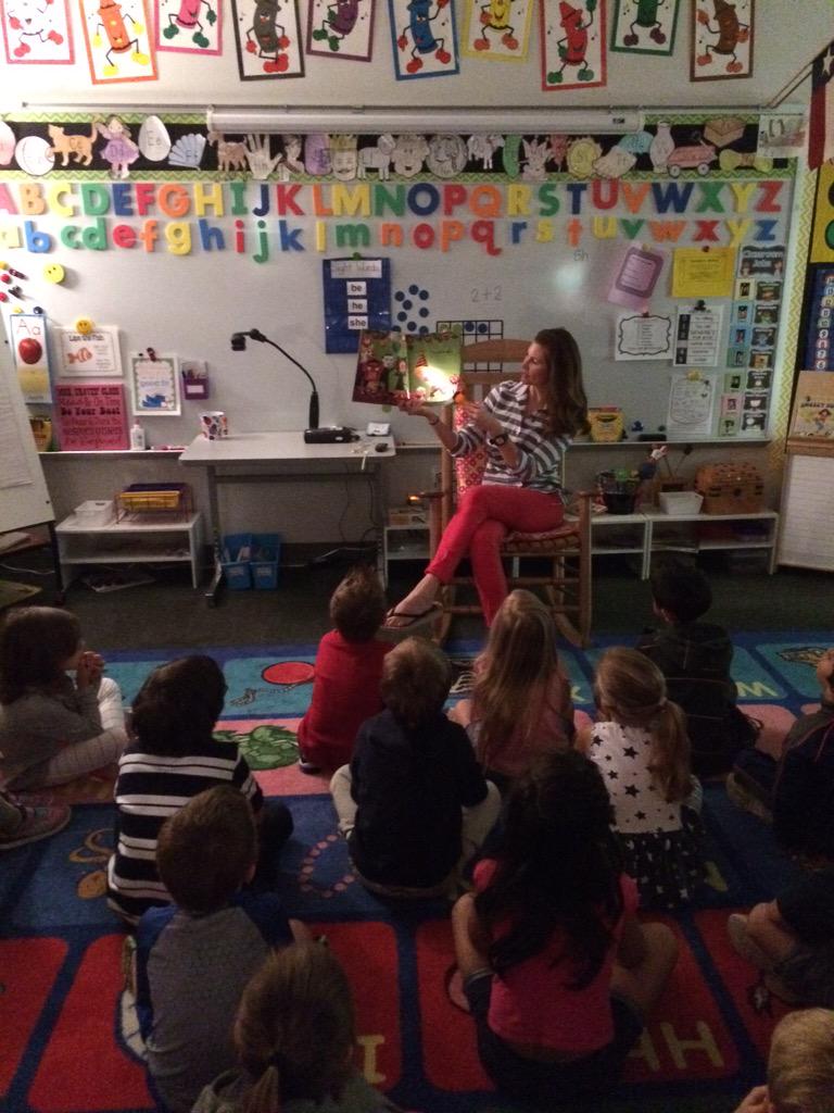 Flashlight reading a Halloween story in the dark. #bcekinder