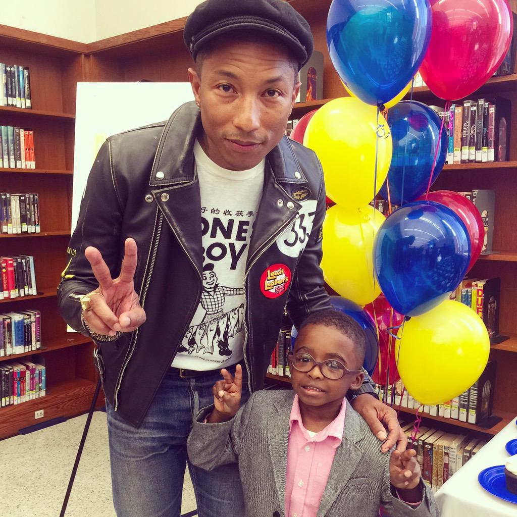 Pharrell's tweet image. Shout out to my Happy Helper, Tyler, who's featured in our new book #ReadHappy bit.ly/ReadHappy