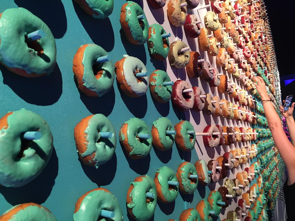 workgroupsdv's tweet image. Yes, that&apos;s a wall entirely of doughnuts. #AdobeMAX #MAXbash