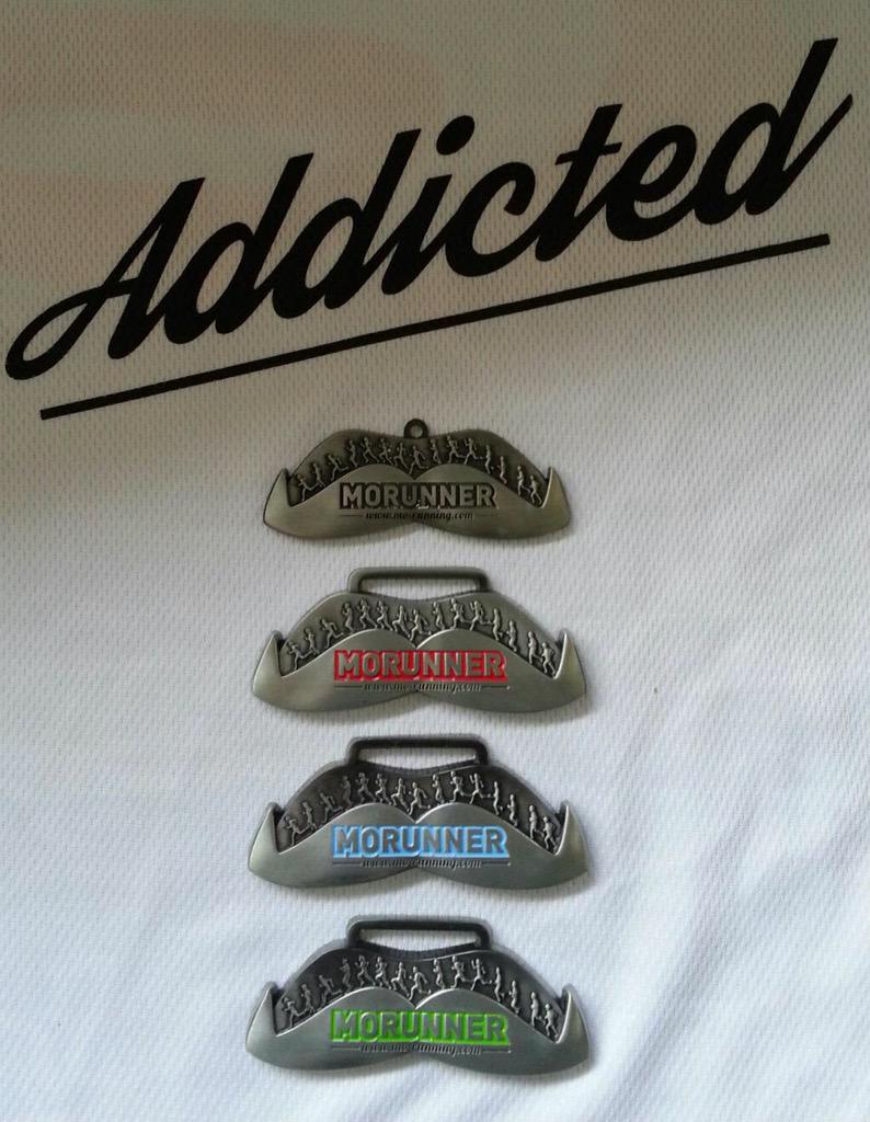 MoRunCardiff's tweet photo. Here are the MoRunning 2015 medals!  Bigger than the 2014 version shown at the top! Who is up for the 2015 MoMedal? http://t.co/CbqGCSzhNx